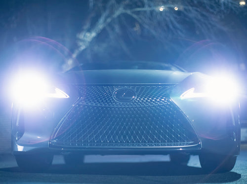 Car interior lit with ambient LED light at night